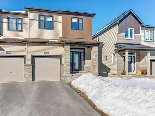 2028 Caltra Crescent, Townhouse with 3 bedrooms, 4 bathrooms and 3 parking in Ottawa ON | Image 1