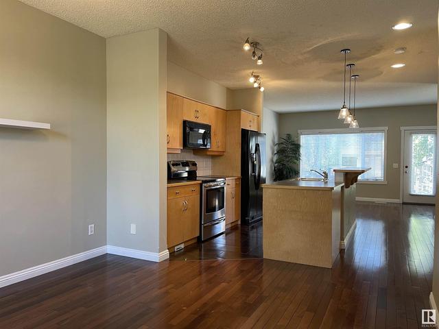 14408 98 St Nw, House attached with 3 bedrooms, 3 bathrooms and null parking in Edmonton AB | Card Image