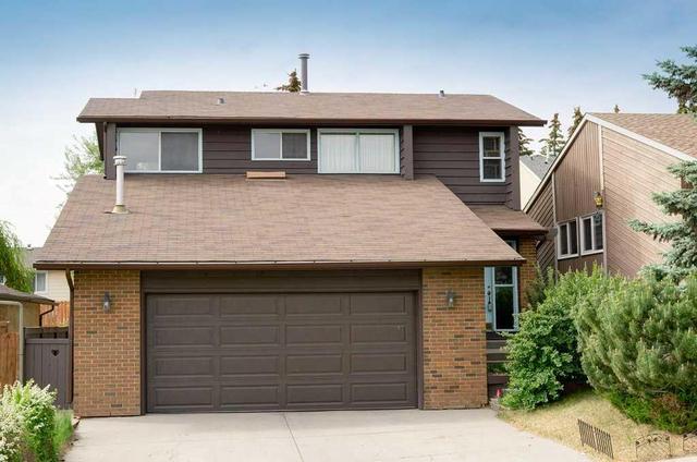 116 Strathcona Close Sw, House detached with 4 bedrooms, 3 bathrooms and 4 parking in Calgary AB | Image 1