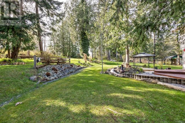 6249 Island Hwy, House detached with 3 bedrooms, 3 bathrooms and 8 parking in Comox Valley A BC | Image 66
