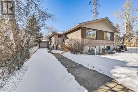 303 38 Street Sw, House semidetached with 3 bedrooms, 2 bathrooms and 3 parking in Calgary AB | Card Image