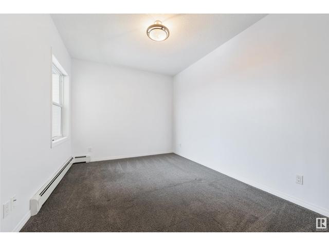 207 - 9927 79 Av Nw, Condo with 2 bedrooms, 2 bathrooms and 2 parking in Edmonton AB | Image 12