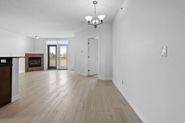 401 - 2419 Centre Street Nw, Condo with 2 bedrooms, 2 bathrooms and 1 parking in Calgary AB | Image 4