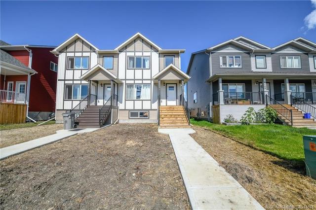 8410 101 Avenue, Home with 3 bedrooms, 2 bathrooms and 2 parking in Greenview No. 16 AB | Image 3