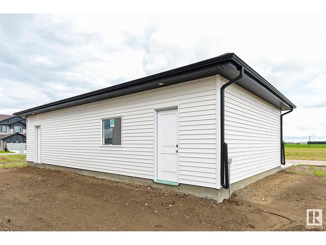 9827 107 Av, House semidetached with 3 bedrooms, 2 bathrooms and null parking in Morinville AB | Image 25