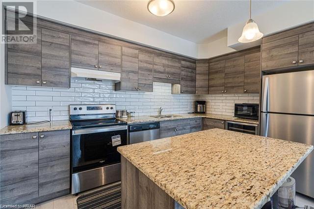 a81 - 261 Woodbine Avenue Avenue, House attached with 2 bedrooms, 2 bathrooms and 1 parking in Kitchener ON | Image 5