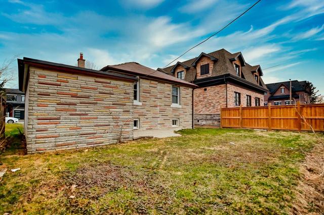83 Twenty Seventh St, House detached with 2 bedrooms, 2 bathrooms and 3 parking in Toronto ON | Image 28