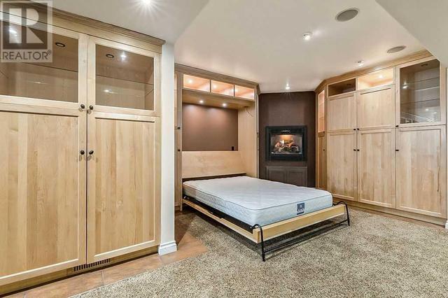 Same view of storage with Murphy bed set up | Image 38