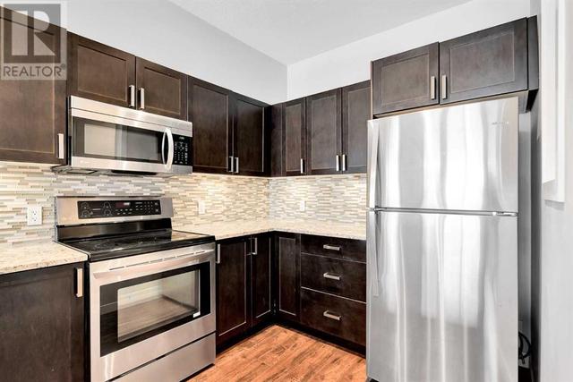 106, - 4303 1 Street Ne, Condo with 2 bedrooms, 2 bathrooms and 1 parking in Calgary AB | Image 7