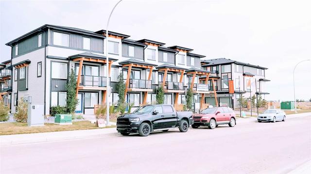 223 Savanna Walk Ne, Townhouse with 2 bedrooms, 1 bathrooms and 1 parking in Calgary AB | Image 13