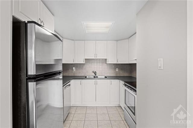 Photos are of another unit with same floor plan but mirror image. | Image 13