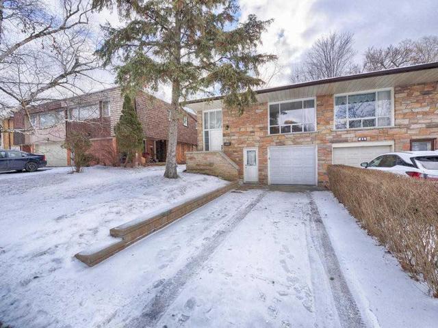 47 Clancy Dr, House semidetached with 3 bedrooms, 2 bathrooms and 2 parking in Toronto ON | Image 1