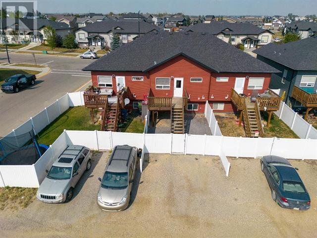 103 Hawkridge Boulevard, House attached with 3 bedrooms, 2 bathrooms and 2 parking in Penhold AB | Card Image