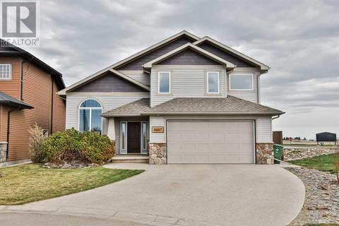 4667 63 Avenue, House detached with 5 bedrooms, 3 bathrooms and 4 parking in Taber AB | Card Image