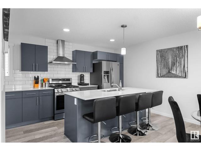 1262 Aster Bv Nw, House attached with 3 bedrooms, 2 bathrooms and 4 parking in Edmonton AB | Image 7