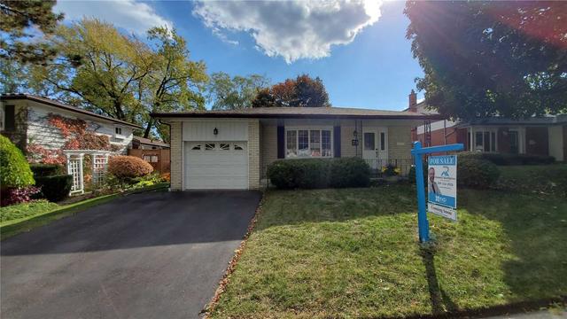 79 Tilley Dr, House detached with 3 bedrooms, 2 bathrooms and 3 parking in Toronto ON | Image 1