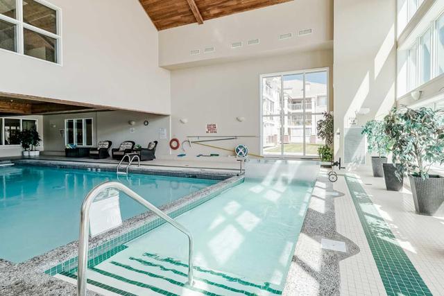 121 - 6868 Sierra Morena Boulevard Sw, Condo with 2 bedrooms, 1 bathrooms and 1 parking in Calgary AB | Image 28