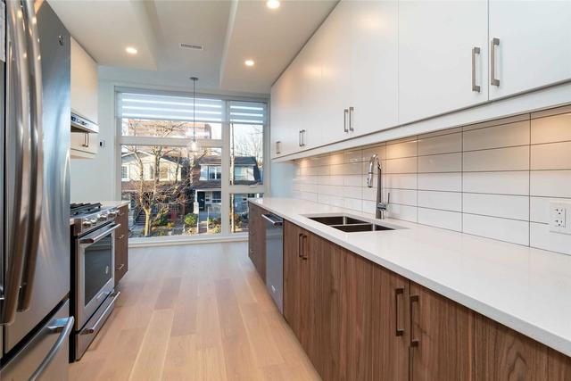 213 Chatham Ave, House semidetached with 2 bedrooms, 4 bathrooms and 2 parking in Toronto ON | Image 14