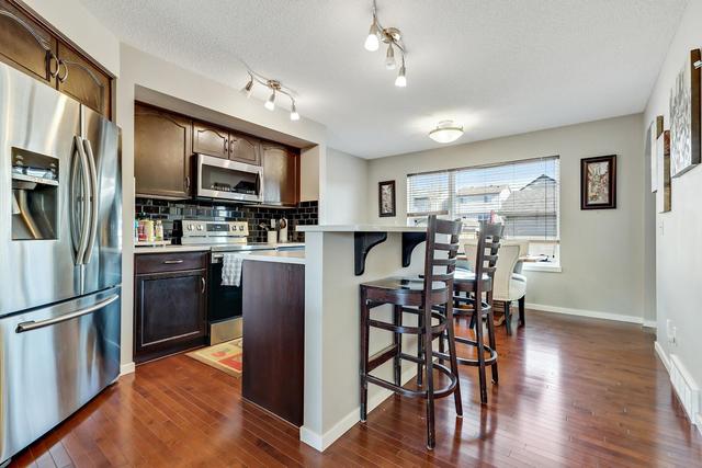 34 Silverado Plains Manor Sw, House detached with 4 bedrooms, 2 bathrooms and 2 parking in Calgary AB | Image 4