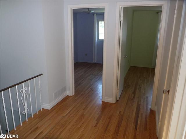 stairs to bedrooms on upper level | Image 2