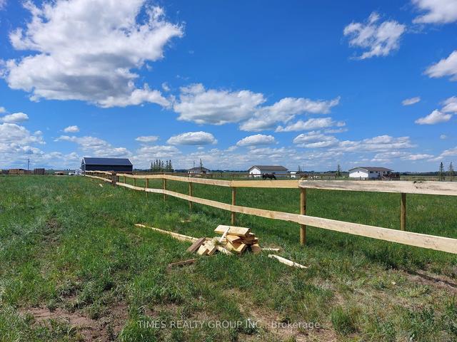 233055 Rge Rd 250, House detached with 2 bedrooms, 3 bathrooms and 14 parking in Wheatland County AB | Image 21