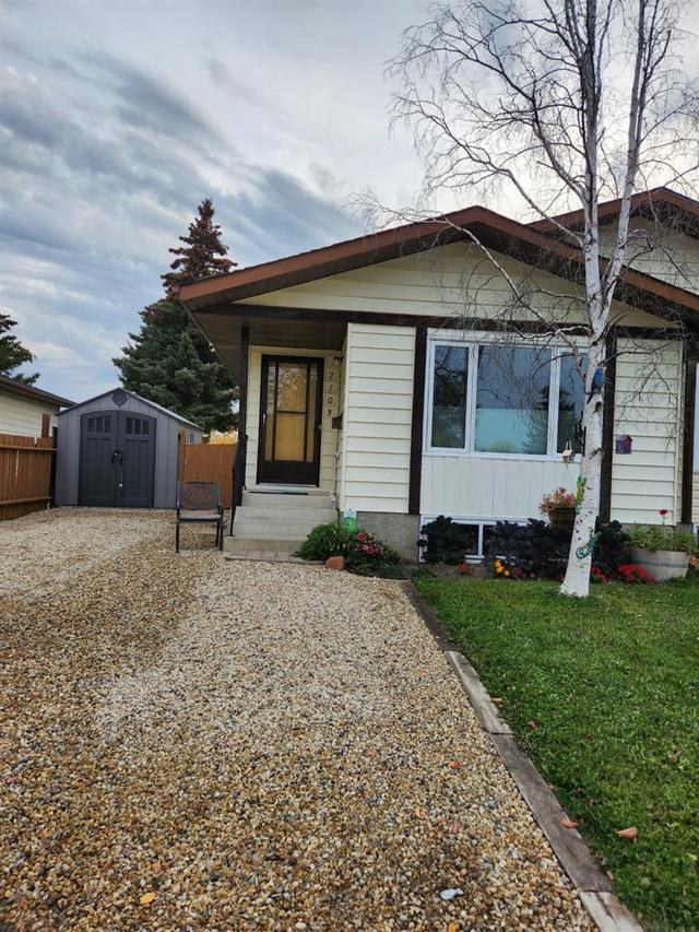 7103 93 Street, Home with 4 bedrooms, 2 bathrooms and 6 parking in Grande Prairie AB | Image 1