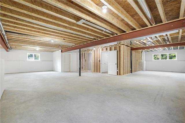 Open concept lower level. Large windows. Add an additional bedroom and/or rec room. | Image 21