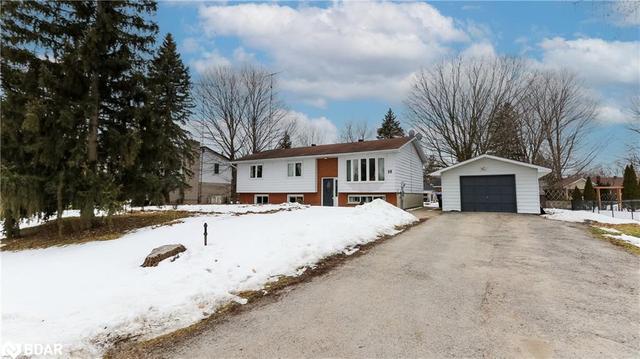 8 Huron Street, House detached with 4 bedrooms, 2 bathrooms and null parking in Springwater ON | Image 1