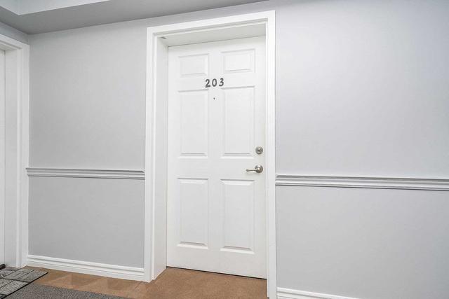 203 - 1380 Main St E, Condo with 2 bedrooms, 1 bathrooms and 1 parking in Milton ON | Image 3