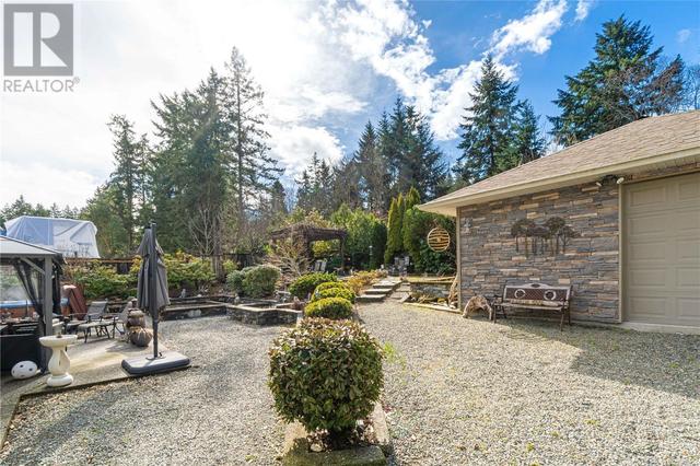 7739 Clark Dr, House detached with 4 bedrooms, 3 bathrooms and 3 parking in Lantzville BC | Image 31
