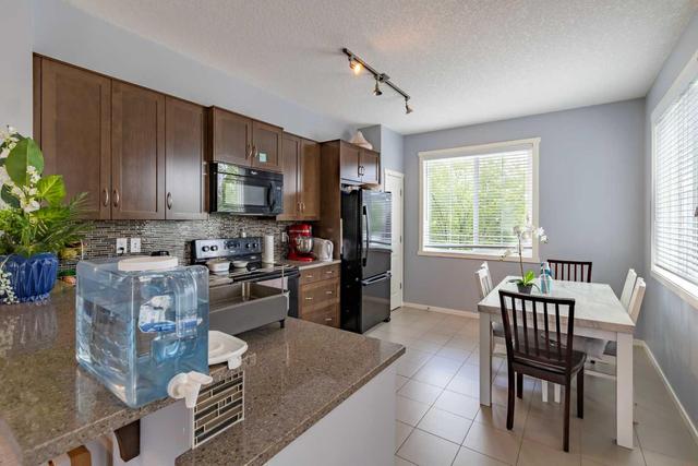 25 Kinlea Way Nw, Home with 3 bedrooms, 2 bathrooms and 3 parking in Calgary AB | Image 11