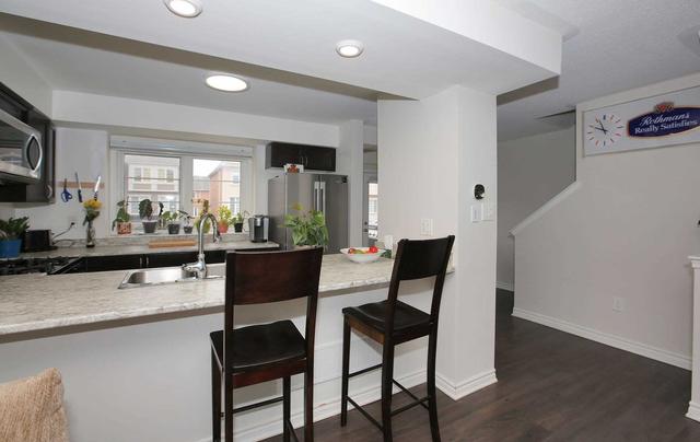 28 Fusilier Dr, House attached with 2 bedrooms, 3 bathrooms and 3 parking in Toronto ON | Image 2