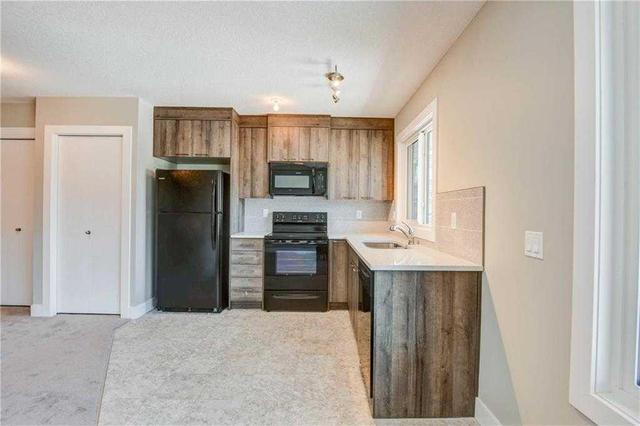 96 Burma Star Road Sw, Home with 4 bedrooms, 3 bathrooms and 2 parking in Calgary AB | Image 31