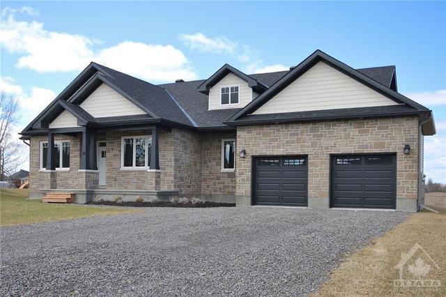 21 Ralph Jago Way, House detached with 4 bedrooms, 2 bathrooms and 10 parking in Ottawa ON | Image 2