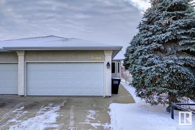 6584 158 Av Nw, House attached with 3 bedrooms, 2 bathrooms and null parking in Edmonton AB | Image 1