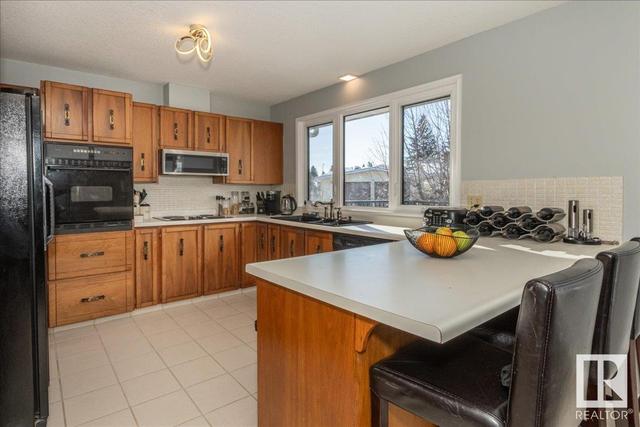 8433 14 Av Nw, House detached with 4 bedrooms, 3 bathrooms and 4 parking in Edmonton AB | Image 11