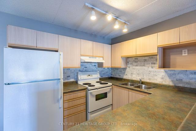 304 - 1411 Walkers Line, Condo with 1 bedrooms, 1 bathrooms and 2 parking in Burlington ON | Image 4