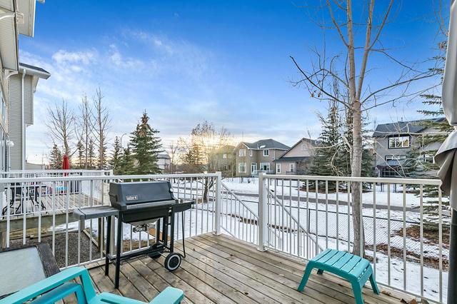 12 Crystal Shores Cove, Home with 2 bedrooms, 2 bathrooms and 2 parking in Calgary AB | Image 30