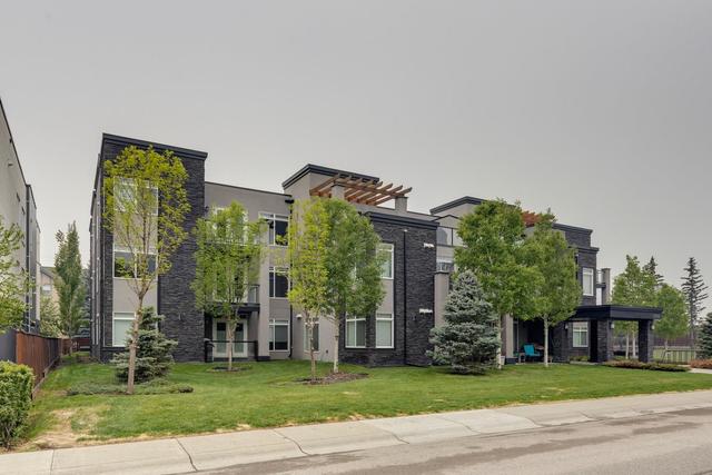 203 - 15207 1 Street Se, Condo with 2 bedrooms, 2 bathrooms and 1 parking in Calgary AB | Image 1