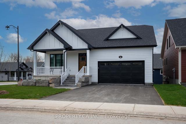 36 Shelter Cove Dr, House detached with 2 bedrooms, 3 bathrooms and 4 parking in Westport ON | Image 1