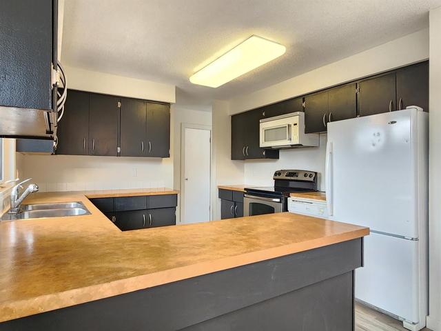 10237 97 Ave, House detached with 3 bedrooms, 2 bathrooms and 3 parking in Greenview No. 16 AB | Image 7