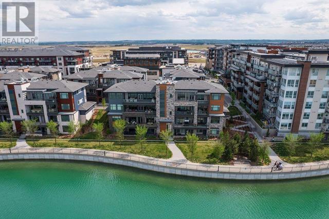 102, - 17 Mahogany Circle Se, Condo with 3 bedrooms, 3 bathrooms and 2 parking in Calgary AB | Image 1