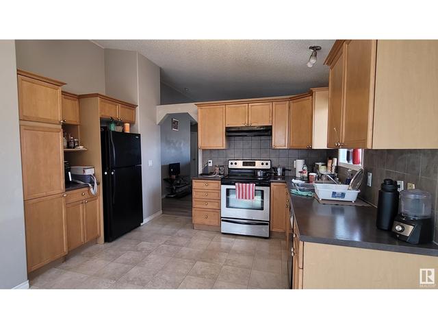 3203 26 Av Nw, House detached with 4 bedrooms, 3 bathrooms and null parking in Edmonton AB | Image 12
