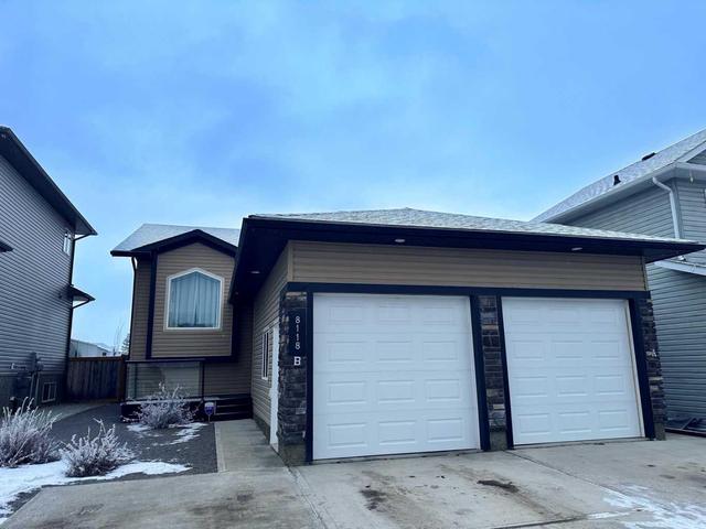 B - 8118 112 Street, House other with 3 bedrooms, 2 bathrooms and null parking in Grande Prairie AB | Image 1