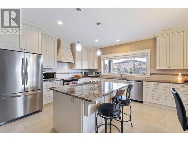 1297 Tanemura Crescent, House detached with 4 bedrooms, 4 bathrooms and 3 parking in Kelowna BC | Image 40