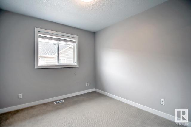 38 - 675 Albany Wy Nw, House attached with 3 bedrooms, 2 bathrooms and 2 parking in Edmonton AB | Image 34