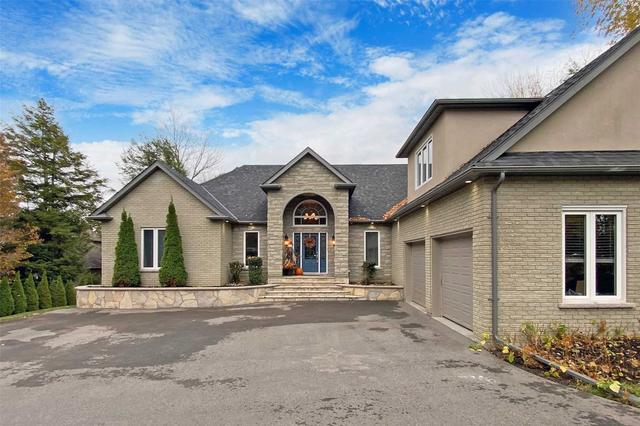 12 Woodland Tr, House detached with 4 bedrooms, 3 bathrooms and 8 parking in Kawartha Lakes ON | Card Image