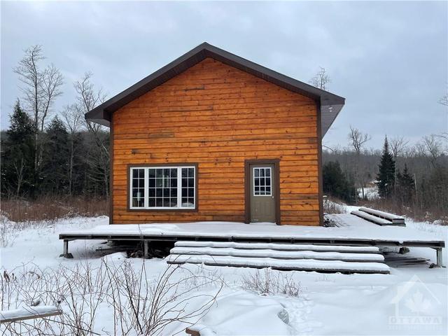 1786 Kashawakawak Lake Trail, House detached with 1 bedrooms, 1 bathrooms and 10 parking in North Frontenac ON | Image 4