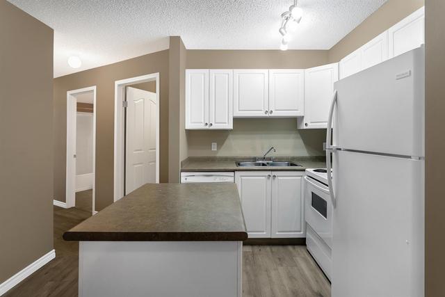 103 - 4000 Sommervale Court Sw, Condo with 2 bedrooms, 2 bathrooms and 1 parking in Calgary AB | Image 4