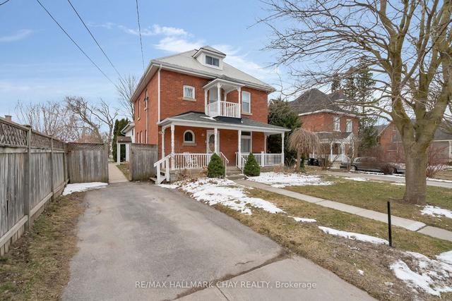 43 Queen St E, House detached with 5 bedrooms, 3 bathrooms and 4 parking in Springwater ON | Image 1